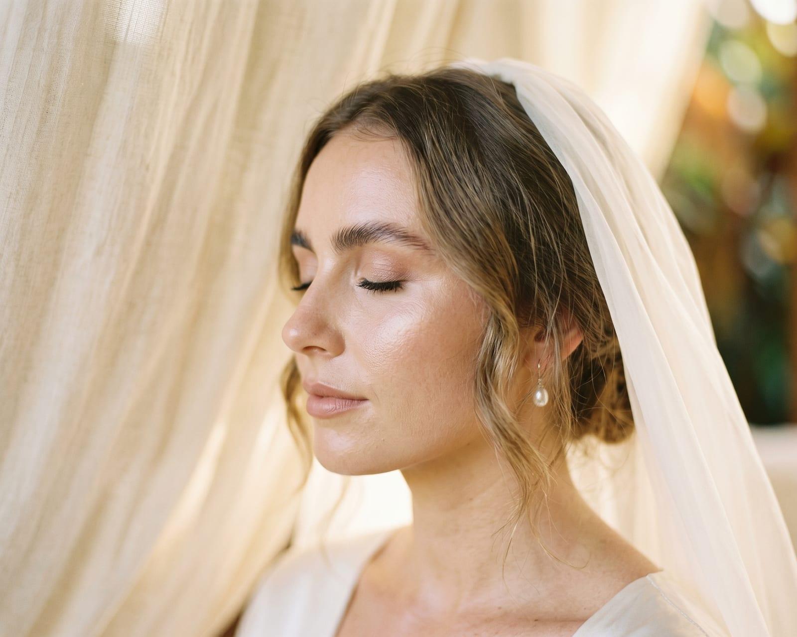 Bride having mobile bridal makeup applied at home in the Hawkesbury